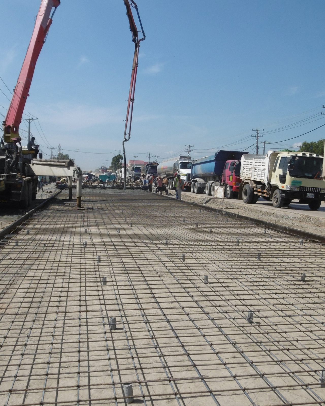 Concrete pour on a reinforced road slab under MATLAB quality control
