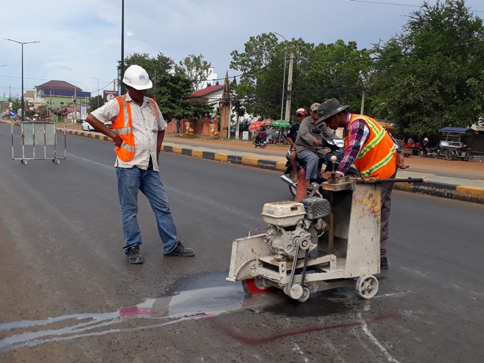 Coring an asphalt road for thickness and density