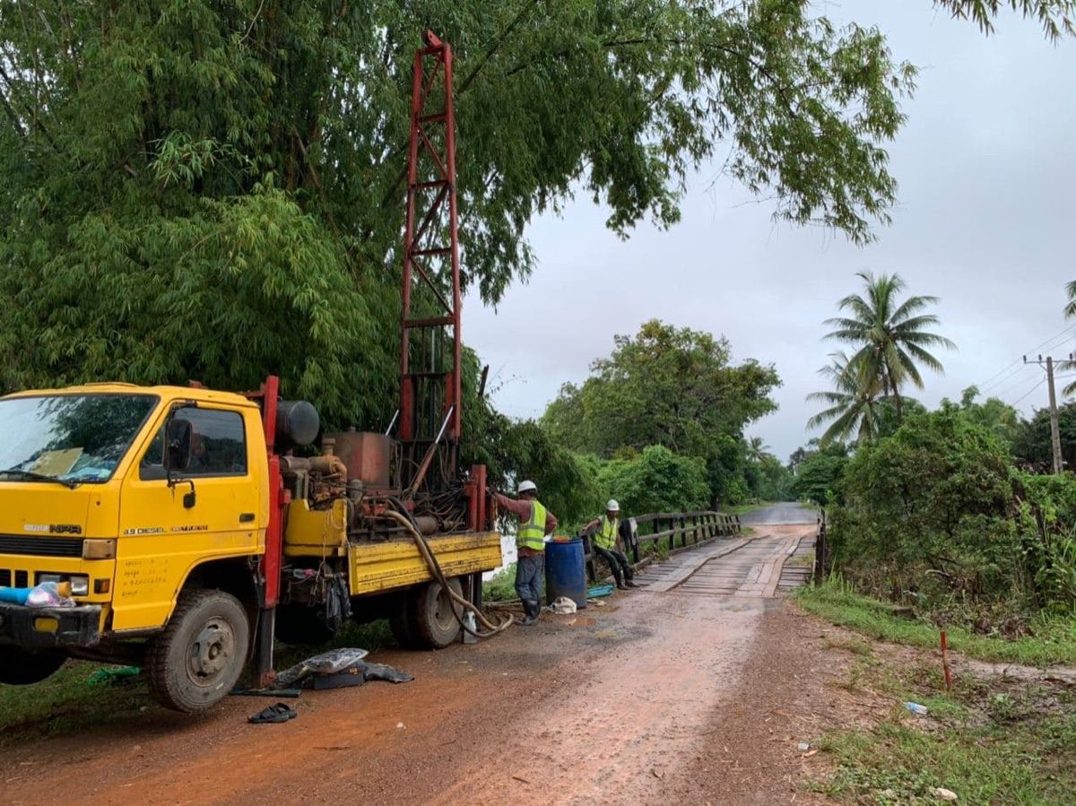 MATLAB drilling rig set up for a site investigation beside a bridge